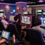Pajaktoto gaming enthusiasts enjoying vibrant slot machines in a modern lounge.