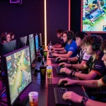 Engaging esports competition at hitclub with players focused on screens and vibrant arena atmosphere.